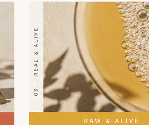 Golden kombucha catching the light in a glass